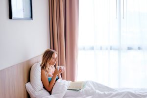 Woman Lying in Bed